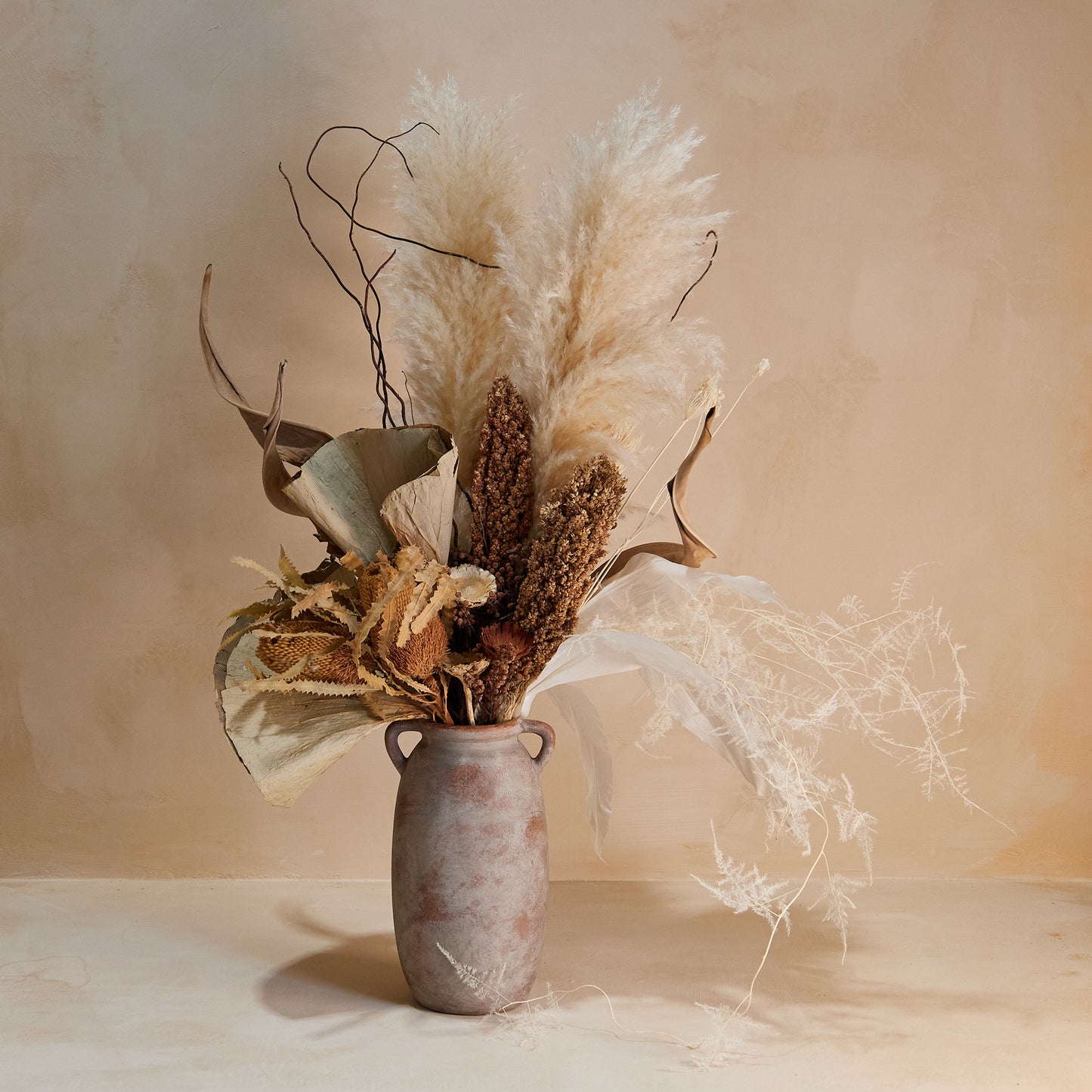 Sculptural Dried Arrangement in Ancient Vase (Miami Local Delivery Only)